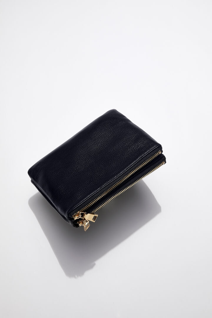 double zip view of mon purses' women's navy pebbled leather double pouch bag with gold hardware not showing the long shoulder strap