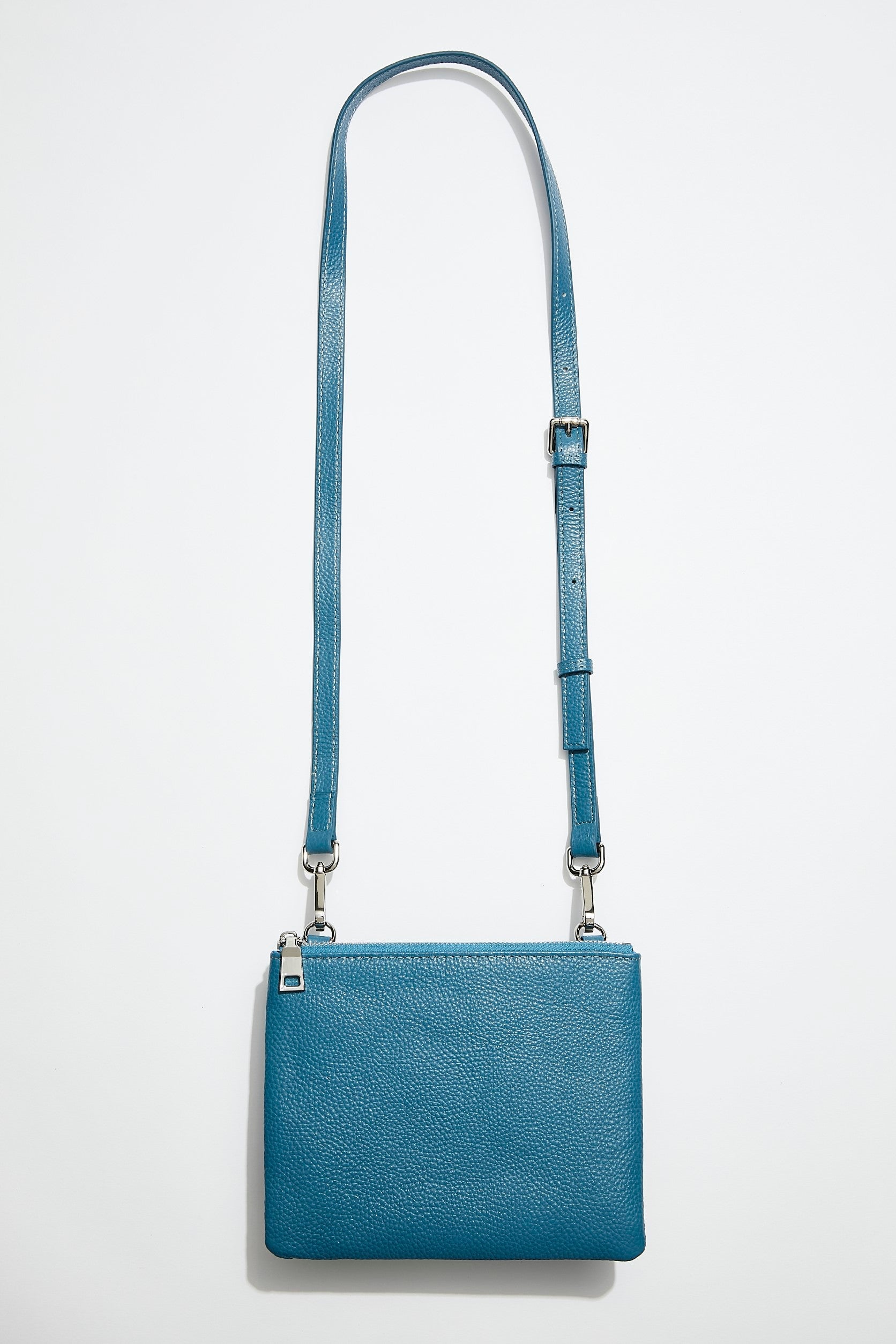 front view of mon purse's sky blue pebbled leather single pouch bag