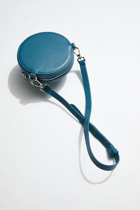 mon purse sky blue circle bag with silver hardware back view