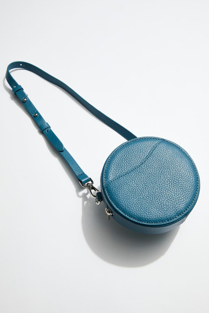 mon purse sky blue circle bag with silver hardware front view