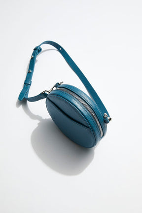 mon purse sky blue circle bag with silver hardware side view