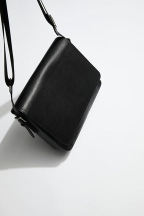 messenger-bag-black-leather-silver-hardware-front-4_7f0d62be-7f50-4535-86e7-3a7d128150ba.jpg