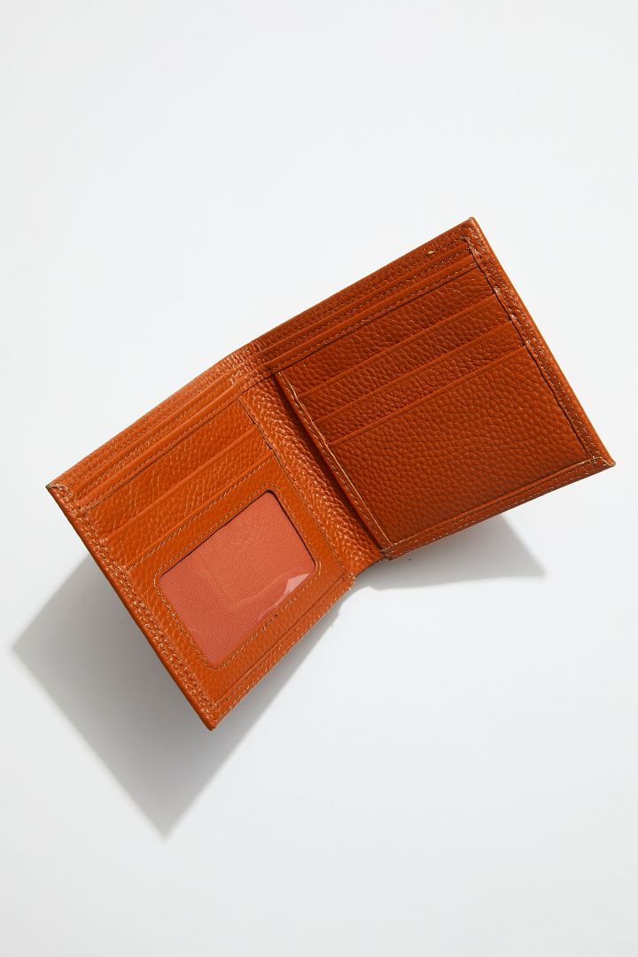 interior view of MON Purses' camel brown pebbled leather men's billfold wallet showing 5 bank card slots, photo window and bills pocket