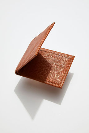 interior view of MON Purses' camel brown pebbled leather men's billfold wallet showing 3 of the 5 bank card slots