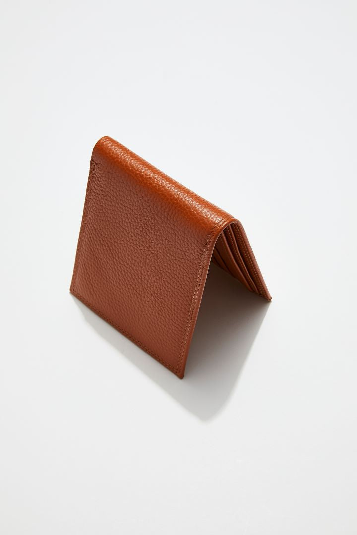 side view of MON Purses' camel brown pebbled leather men's billfold wallet 