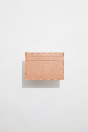 front view of MON Purses' blush pink pebbled leather cardholder for both women and men featuring 2 bank card slots