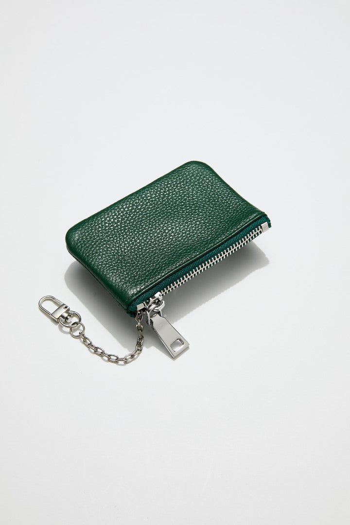 back view of mon purses' dark green pebbled green leather coin purse with silver zip an chain with clasp