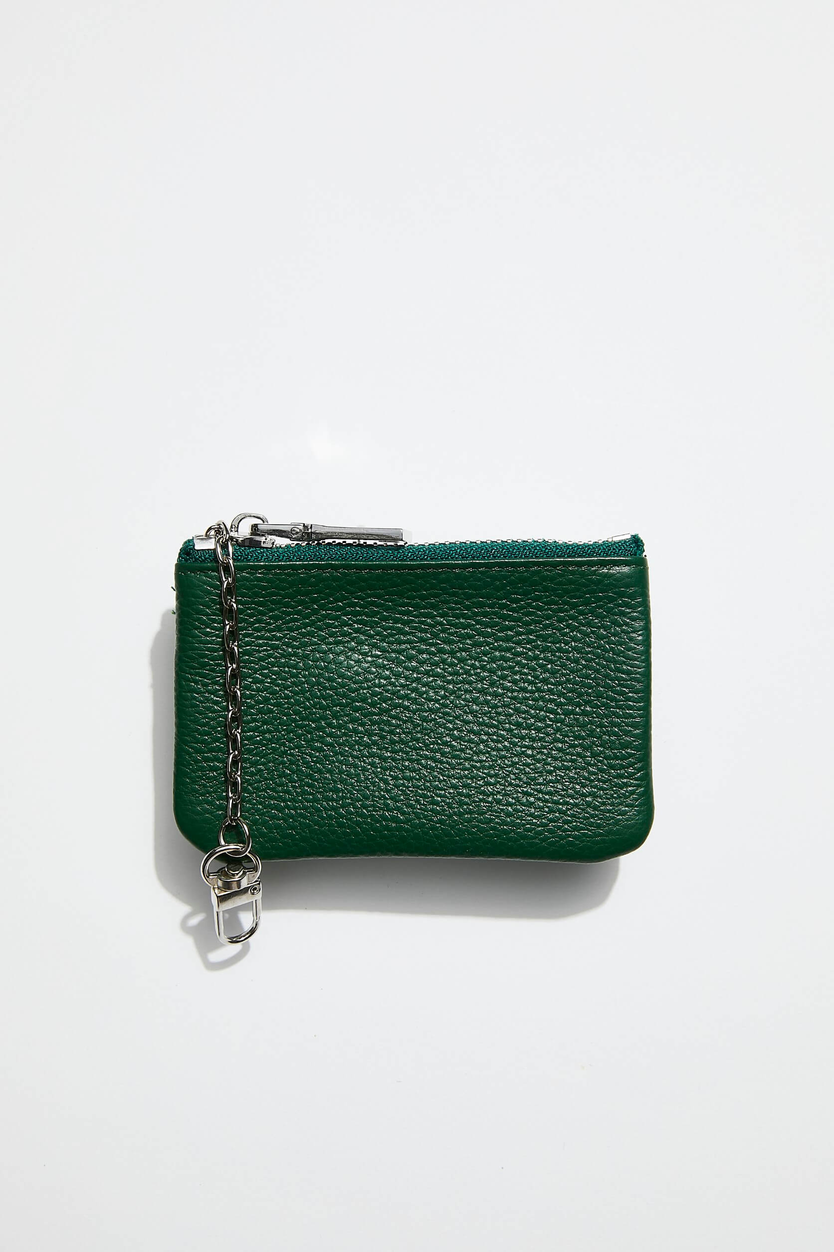 front view of mon purses' dark green pebbled green leather coin purse with silver zip an chain with clasp