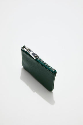 top view of mon purses' dark green pebbled green leather coin purse with silver zip