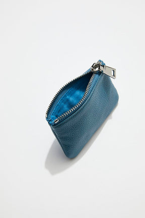 interior view of mon purses' sky blue pebbled leather coin purse with silver zip