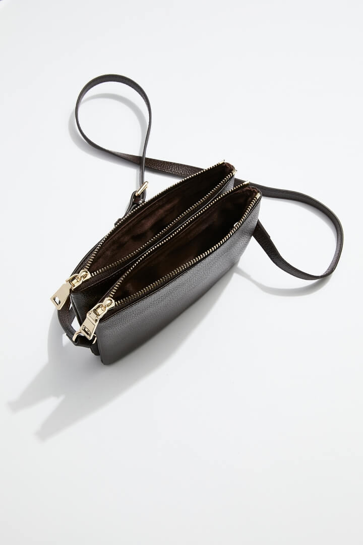 interior view of mon purses' women's double pouch bag in chocolate brown pebbled leather and gold hardware with long shoulder strap showing interior of both the pouches