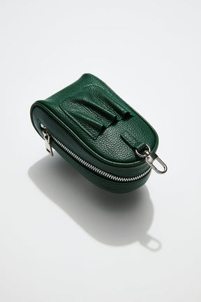 back view of mon purses' dark green pebbled leather golf pocket showing 3 pockets to place your golf tees