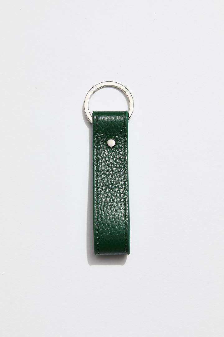 front view of MON Purses' personalised dark green pebbled leather Loop Keyring with silver hardware