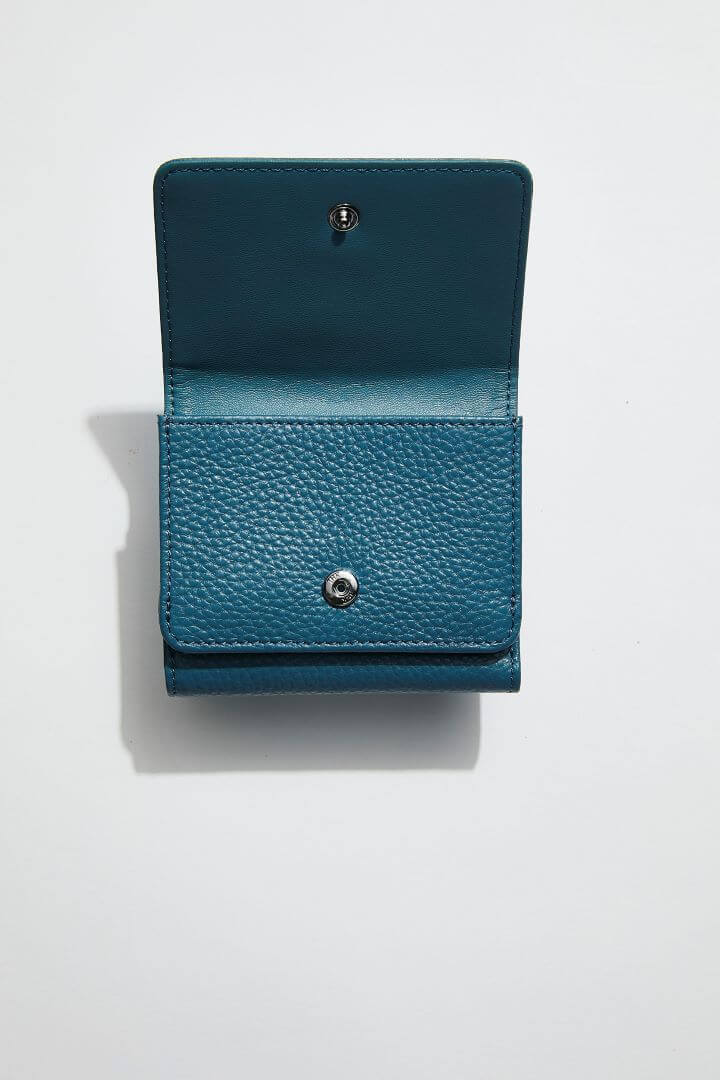 interior on view of mon purse's sky blue women's leather petite fold wallet showing coin pocket