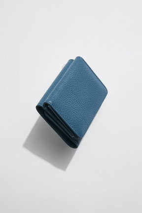 side on view of mon purse's sky blue women's leather petite fold wallet