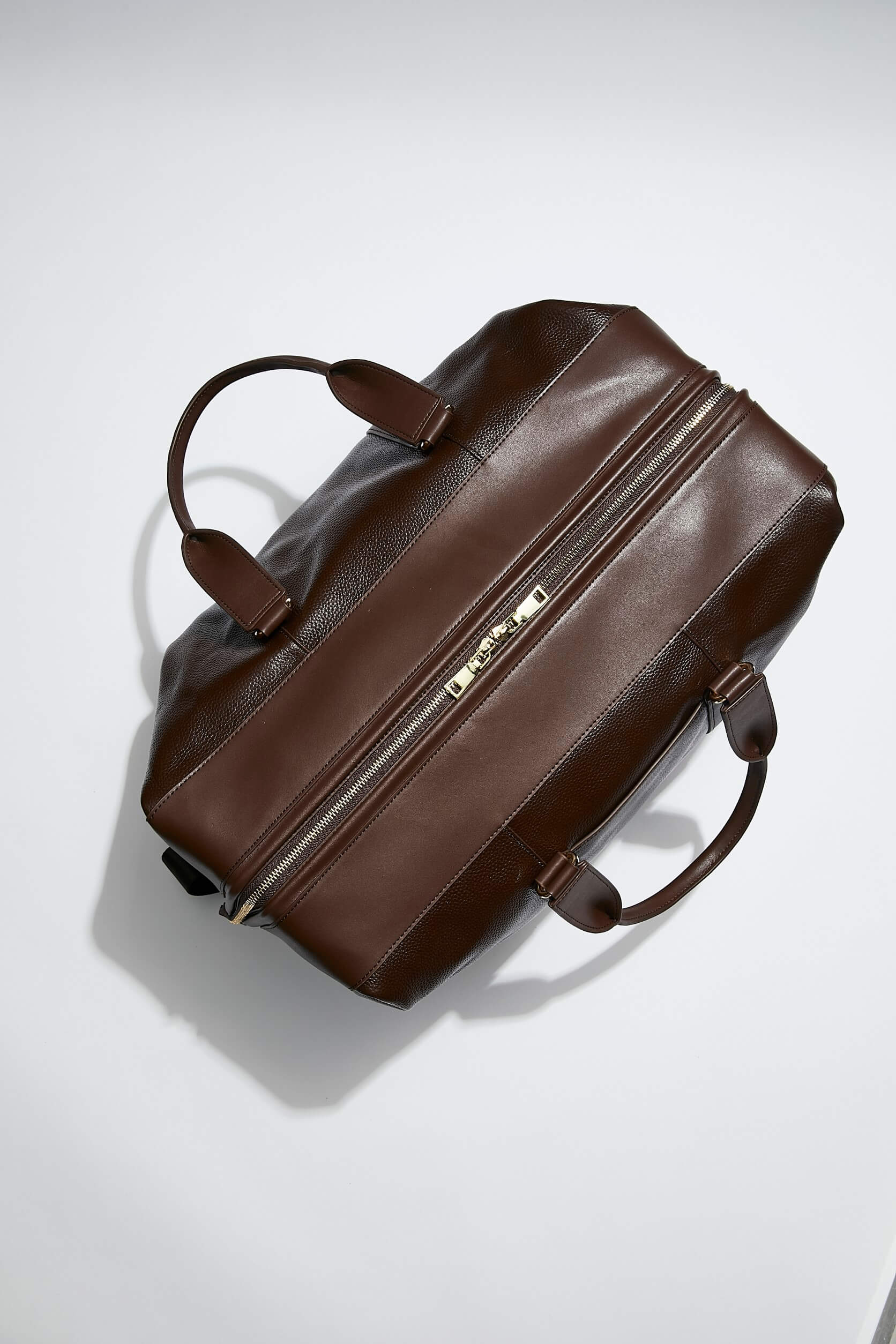 mon-purse-weekender-bag-chocolate-brown-leather-gold-hardware-side_1.jpg